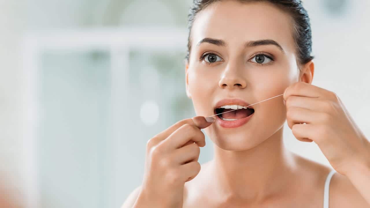 The Link Between Poor Flossing and Gum Disease Stafford